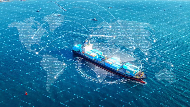Aerial view of a container ship crossing the ocean with a world map and shipping route network overlay